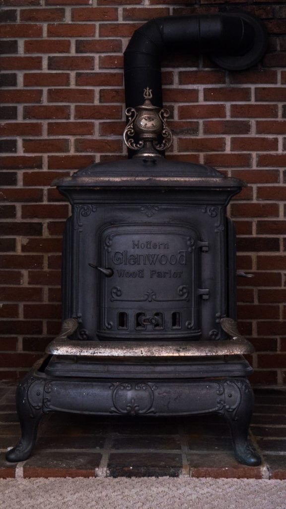 A small cast iron stove.